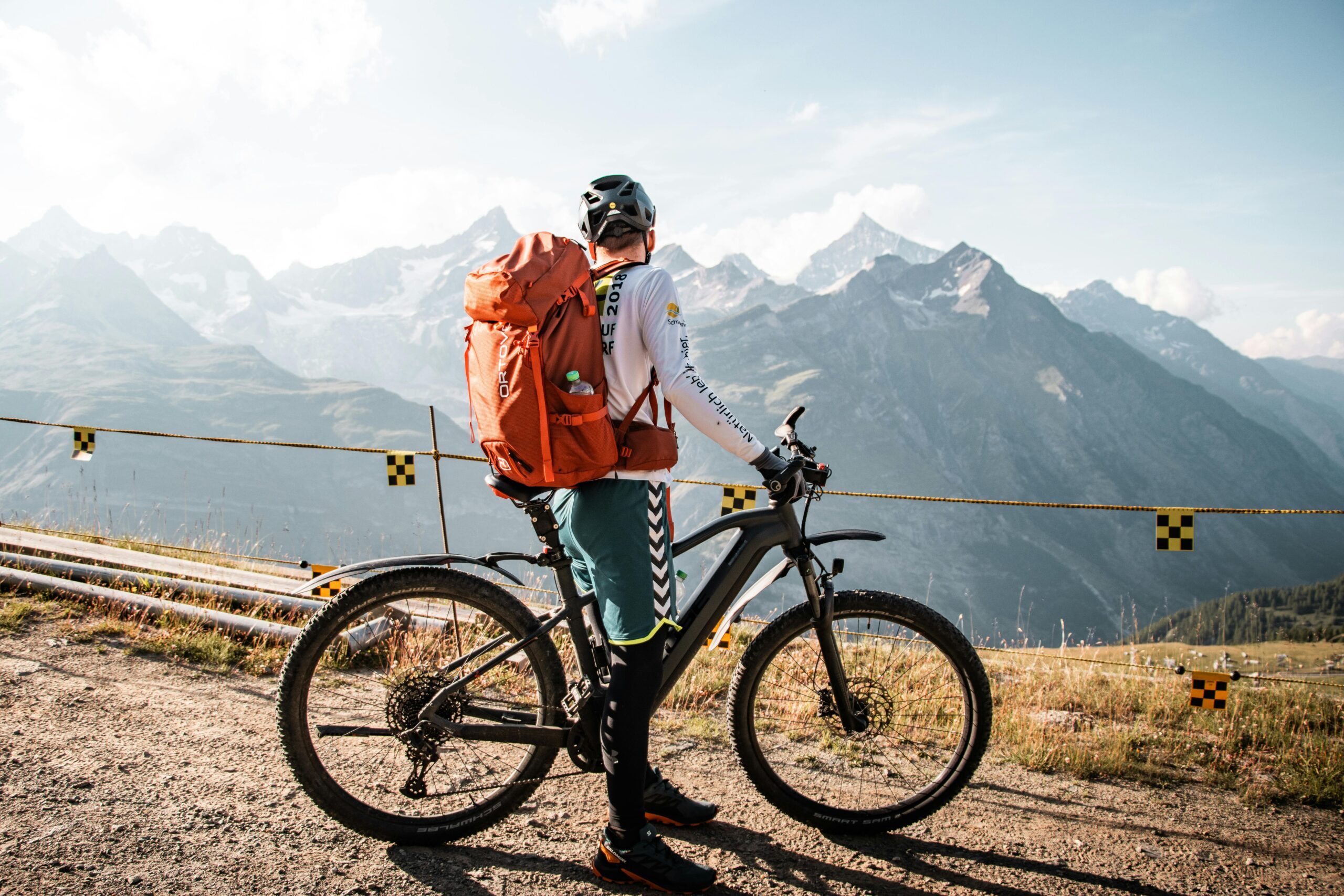 Man on Bike Trip in Mountains